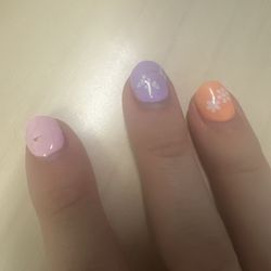 90's Nails & Spa - Stickers and gel top coat peeled off.