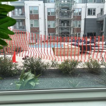 The View at Belterra - Scaffolding and fencing blocking windows - Apartments Near Me - Austin, Texas The View at Belterra - Scaffolding and fencing blocking windows - Apartments Near Me - Austin, Texas