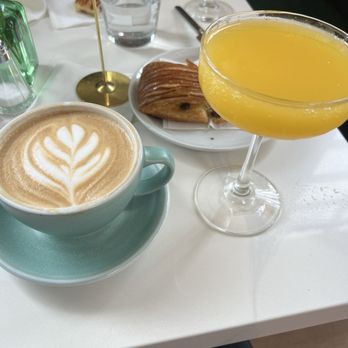 Le Marais Bakery - Latte, chocolate croissant and mimosa. - Coffee & Tea Near Me - Mill Valley, California