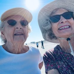 AGC caregiver and client visit Wrightsville Beach for a beautiful walk on the strand.