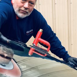Glass Doctor of Syracuse, NY - Ted Schenck our auto glass specialist fitting a windshield.