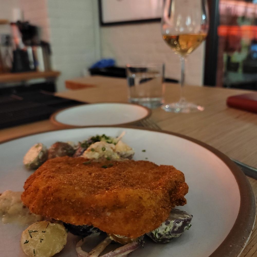 Stock Cafe - Pork schnitzel with warm potato salad - Cocktail Bars Near Me - Roanoke, Virginia Stock Cafe - Pork schnitzel with warm potato salad - Cocktail Bars Near Me - Roanoke, Virginia