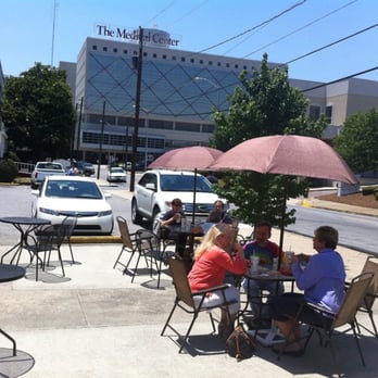 Roly Poly Sandwiches - a group of people eating outside - Sandwiches Near Me - Macon, Georgia