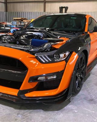 Mustang Carbon Fiber Paint - This Paint work was done at owner request to add some pizazz to already awesome car!
We painted the orange candy over the carbon fiber hood/trunk and matched the orange perfectly on the front panels. Customer was very pleased! Mustang Carbon Fiber Paint - This Paint work was done at owner request to add some pizazz to already awesome car!
We painted the orange candy over the carbon fiber hood/trunk and matched the orange perfectly on the front panels. Customer was very pleased!