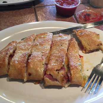 Snappy Tomato Pizza - Calzone- very well stuffed and lots of banana peppers - Pizza Near Me - Union City, Tennessee