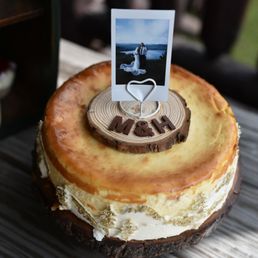 Cheesecake with gold leaf trim from Patisserie, photographed by Skaneateles Portraits in Old Forge, Adirondacks for a mountain elopement! Cheesecake with gold leaf trim from Patisserie, photographed by Skaneateles Portraits in Old Forge, Adirondacks for a mountain elopement!