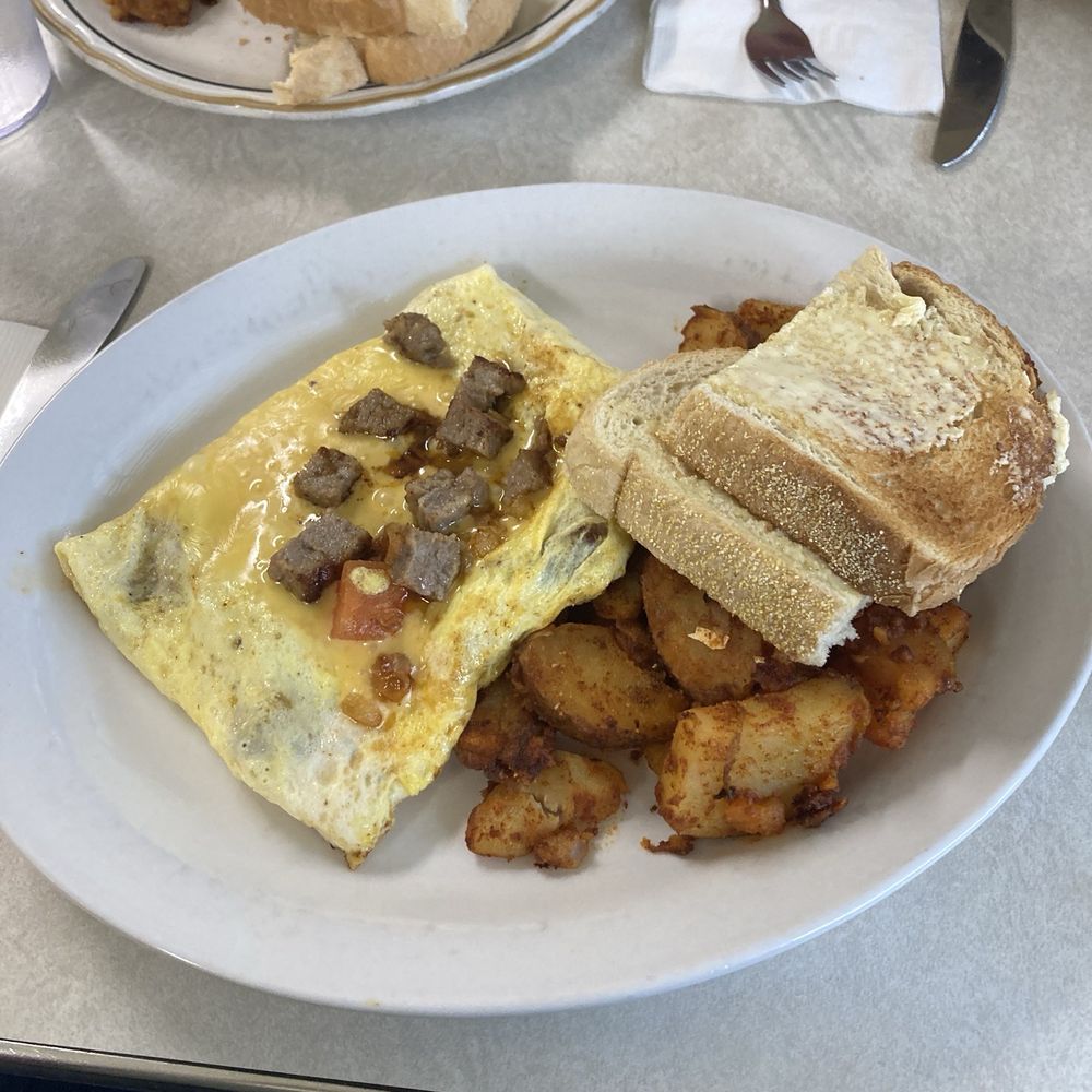 Two Eggs potato's and Toast Two Eggs potato's and Toast