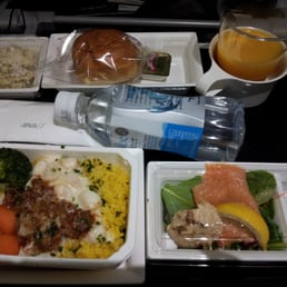 Dinner: creamy seafood with saffron rice with smoked salmon salad, potato salad, and a dinner roll Dinner: creamy seafood with saffron rice with smoked salmon salad, potato salad, and a dinner roll