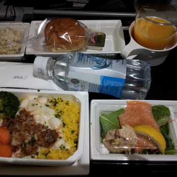 All Nippon Airways - Dinner: creamy seafood with saffron rice with smoked salmon salad, potato salad, and a dinner roll - Airlines Near Me - San Francisco, California All Nippon Airways - Dinner: creamy seafood with saffron rice with smoked salmon salad, potato salad, and a dinner roll - Airlines Near Me - San Francisco, California