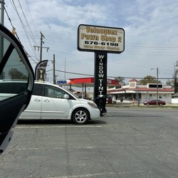 Ssandy's Grill - It's in this parking lot