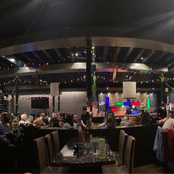 Kalbi - a large group of people in a restaurant - Sushi Bars Near Me - Montreal, Quebec