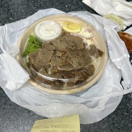 there's a Gyro bowl only has meat rice, one piece of lettuce and a lemon slice, where are the cucumbers, tomatoes, Romain lettuce, onions there's a Gyro bowl only has meat rice, one piece of lettuce and a lemon slice, where are the cucumbers, tomatoes, Romain lettuce, onions