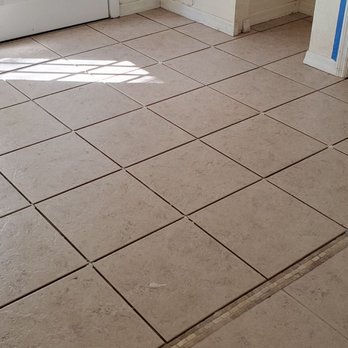 Minions Handyman Services - a tiled floor in a home - Handyman Near Me Minions Handyman Services - a tiled floor in a home - Handyman Near Me
