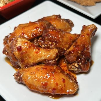 Wok This Way - a plate of chicken wings and rice - Chinese Near Me - San Antonio, Texas