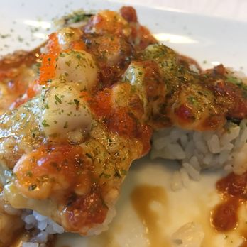 En Japanese Cuisine - Volcano - baked scallop with homemade hot sauce. Yum - Sushi Bars Near Me - Frisco, Texas