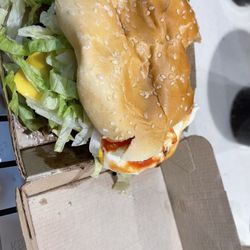 McDonald's - Another view of condiments dumped near, not on the bun.