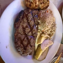 NY Strip with grilled shrimps. Comes with 3, ate one before I can snap a pic. NY Strip with grilled shrimps. Comes with 3, ate one before I can snap a pic.