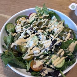 Sage & Cedar Cafe - Make your own salad bowl with sriracha dressing! Delicious just needed a little more of it for price.
