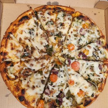 Vegan Pizza - Spicy Thai Pizza 4/5 (Left) and Mediterranean Pizza 2/5 (Right) - Pizza Near Me - Garden Grove, California Vegan Pizza - Spicy Thai Pizza 4/5 (Left) and Mediterranean Pizza 2/5 (Right) - Pizza Near Me - Garden Grove, California