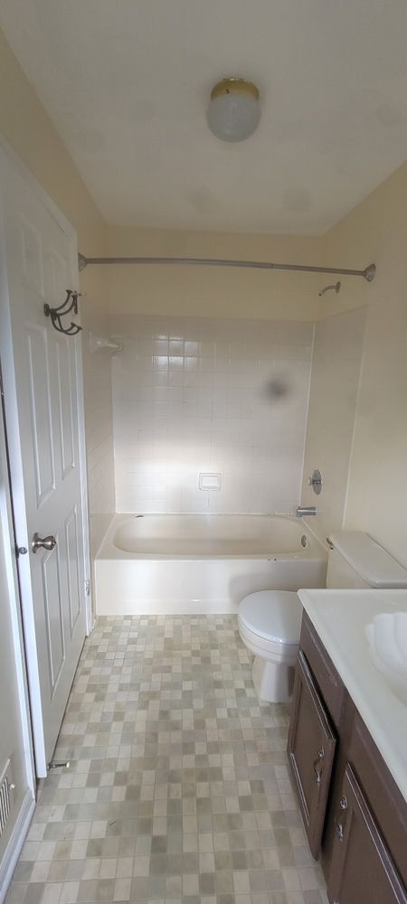 Slide of Prestige tile and bath