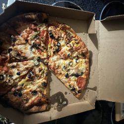 Domino's Pizza - Asked for olives bacon and pepperoni received the 3 toppings including onions peppers and sausage I never order those toppings ever.