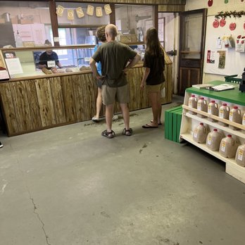 Wasem Fruit Farm - Donut stand/line, and the main counter where you pay for fruit is on the right - Pick Your Own Farms Near Me - Milan, Michigan