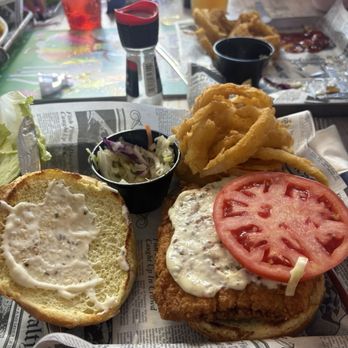 The Draft House Lakeside Bar & Grille - Haddock filet sandwich with onion rings and slaw. - Cocktail Bars Near Me - Kingston, New Hampshire The Draft House Lakeside Bar & Grille - Haddock filet sandwich with onion rings and slaw. - Cocktail Bars Near Me - Kingston, New Hampshire