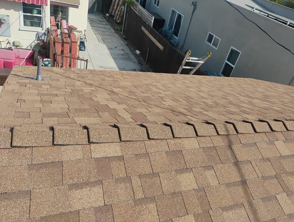 Slide of Crown Roofing