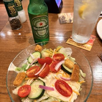 Outback Steakhouse - House Side Salad and Heineken - Steakhouses Near Me - Kissimmee, Florida Outback Steakhouse - House Side Salad and Heineken - Steakhouses Near Me - Kissimmee, Florida