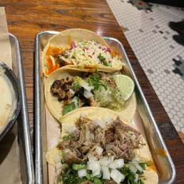 Al pastor taco, enchilada taco, and carnitas taco Al pastor taco, enchilada taco, and carnitas taco