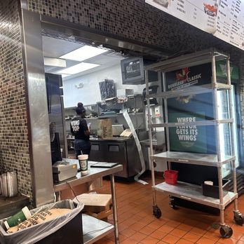 Wingstop - This m* was on her phone all the time , bad service , and charged 3 DA*M Dollers for a CUP. - Chicken Wings Near Me - Baton Rouge, Louisiana
