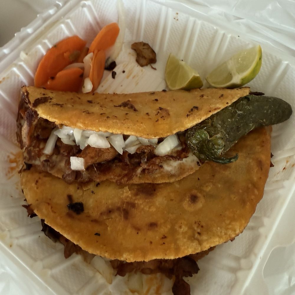 Fresh masa tortillas, grilled chicken, cheese, peppers.