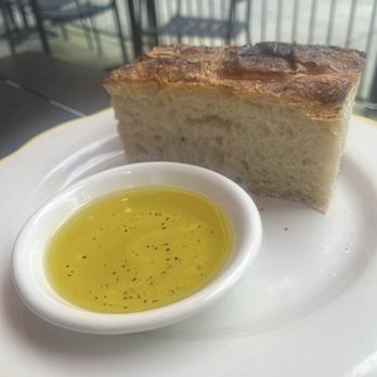 Mano Bella - SouthPark - Focaccia and olive oil - Italian Near Me - Charlotte, North Carolina Mano Bella - SouthPark - Focaccia and olive oil - Italian Near Me - Charlotte, North Carolina
