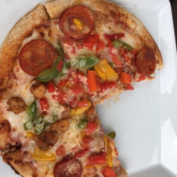 Harry's Poolside Bar & Grill - Sausage is pepperoni sized. This thing was $16. Feeds maybe one disappointed 5 yo, feeds 1/3 of an angry ripped off full-grown woman - American Near Me - Orlando, Florida Harry's Poolside Bar & Grill - Sausage is pepperoni sized. This thing was $16. Feeds maybe one disappointed 5 yo, feeds 1/3 of an angry ripped off full-grown woman - American Near Me - Orlando, Florida