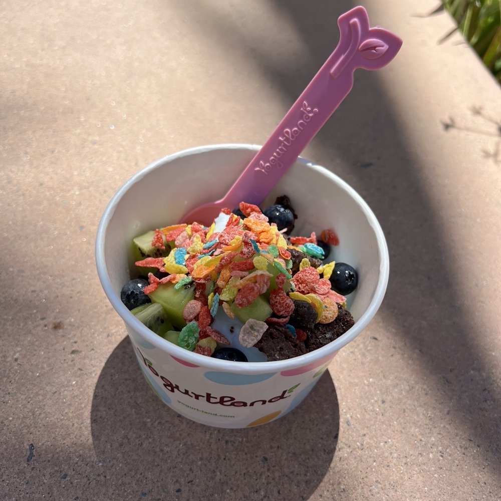 Brownies, kiwi, blueberries, and fruity pebbles on top of Rocket Pop Sorbet Brownies, kiwi, blueberries, and fruity pebbles on top of Rocket Pop Sorbet