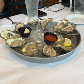 Half Shell Oyster House - A dozen raw during happy hour ($5 off) - Cajun/Creole Near Me - Pelham, Alabama Half Shell Oyster House - A dozen raw during happy hour ($5 off) - Cajun/Creole Near Me - Pelham, Alabama