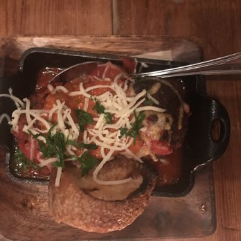 Barbuzzo - Meatball in a tomato sauce with cheese on top. - Mediterranean Near Me - Philadelphia, Pennsylvania Barbuzzo - Meatball in a tomato sauce with cheese on top. - Mediterranean Near Me - Philadelphia, Pennsylvania