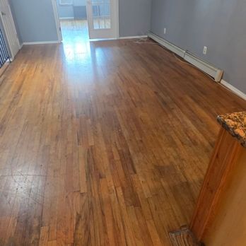 Defender Flooring - A different angle of the main living space, before - Flooring Near Me