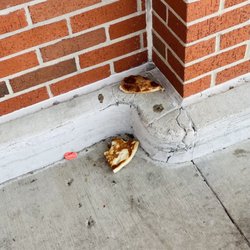 ALDI - Pizza left by the gypsies, begging outside of my Aldi.