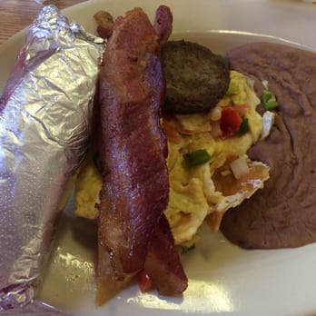 Cortez Cafe - The Migas plate with sausage added - Mexican Near Me - Bay City, Texas Cortez Cafe - The Migas plate with sausage added - Mexican Near Me - Bay City, Texas