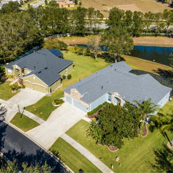 Noland's Roofing - Aerial view of two newly roofed homes in Clermont, Florida by Noland's Roofing, trusted Clermont roofers serving all of Centr... - Roofing Near Me - Clermont, Florida Noland's Roofing - Aerial view of two newly roofed homes in Clermont, Florida by Noland's Roofing, trusted Clermont roofers serving all of Centr... - Roofing Near Me - Clermont, Florida