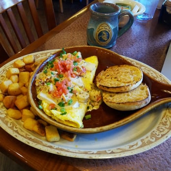Another Broken Egg Cafe - Lobster and Brie omelette with seasoned potatoes. - Breakfast & Brunch Near Me - Indianapolis, Indiana