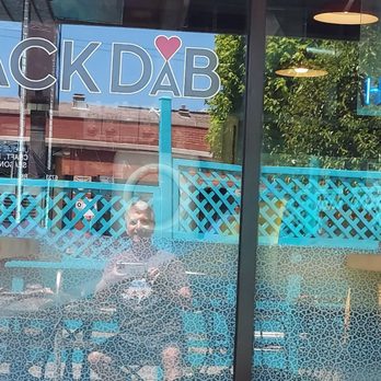 Smack Dab - Outdoor patio with benches and tables. - Breakfast & Brunch Near Me - Chicago, Illinois