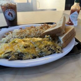 Veggie and Gyro omelette, hash browns, toast