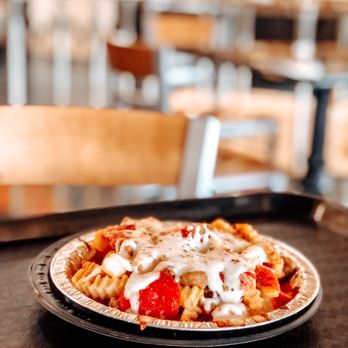 Universal Studios Florida - Pizza fries at Louie's - Amusement Parks Near Me - Orlando, Florida Universal Studios Florida - Pizza fries at Louie's - Amusement Parks Near Me - Orlando, Florida
