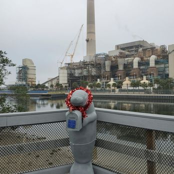 Manatee Viewing Center - The TECO power plant in the background of one of the viewing areas - Zoos Near Me - Apollo Beach, Florida