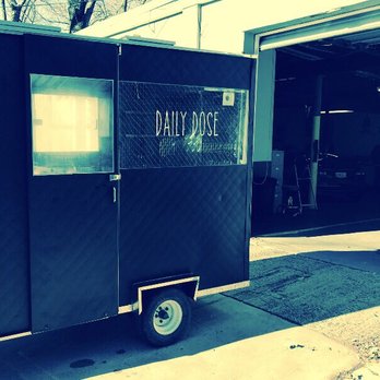Daily Dose - a food truck parked in front of a garage - Food Trucks Near Me - Staten Island, New York