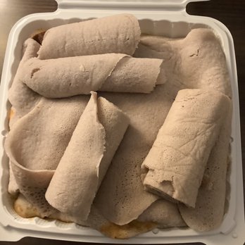 Das Ethiopian - Das Vegetarian Entree Sampler--take out the injera placed on the top - Ethiopian Near Me - Washington, DC, District of Columbia Das Ethiopian - Das Vegetarian Entree Sampler--take out the injera placed on the top - Ethiopian Near Me - Washington, DC, District of Columbia