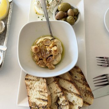 Noah's - Little bites with roasted garlic. - New American Near Me - Greenport, New York Noah's - Little bites with roasted garlic. - New American Near Me - Greenport, New York