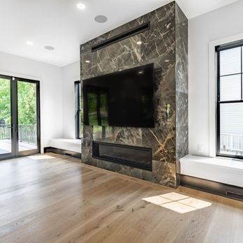 G&A General Contractors - Open living room with fireplace in modern custom home - General Contractors Near Me - McLean, Virginia